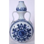 A CHINESE TWIN HANDLED PORCELAIN “ROSETTE” MOONFLASK OR BIANHU, decorated in the Islamic taste. 28