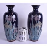 A LARGE PAIR OF 19TH CENTURY JAPANESE MEIJI PERIOD CLOISONNE ENAMEL VASES decorated with foliage. 3