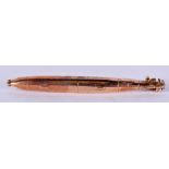 A RARE ANTIQUE 9CT GOLD MARITIME TORPEDO BROOCH. 2.3 grams. 4.5 cm wide.