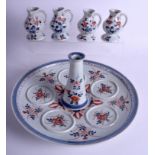 A VERY RARE 17TH/18TH CENTURY CHINESE IMARI OIL JUG SET ON STAND Kangxi/Yongzheng, painted with flo