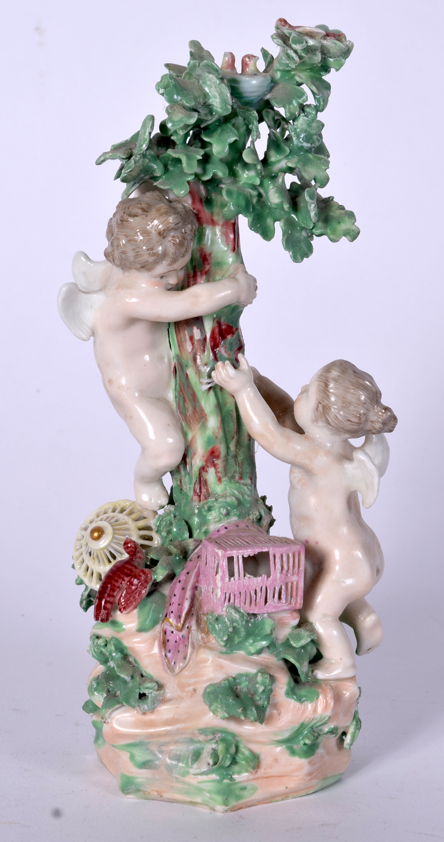 AN 18TH CENTURY CHELSEA DERBY PORCELAIN FIGURINE FORMED AS TWO WINGED CHERUBS, modelled climbing a