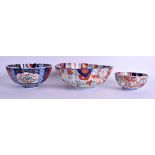 THREE 19TH CENTURY JAPANESE MEIJI PERIOD IMARI BOWLS. Largest 21 cm wide. (3)