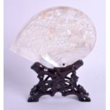 A SMALL EARLY 20TH CENTURY CHINESE CARVED MOTHER OF PEARL SHELL upon a fitted stand. Shell 14 cm x