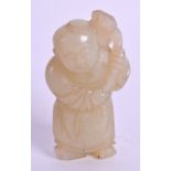 A 19TH CENTURY CHINESE CARVED GREEN JADE FIGURE OF A BOY Qing, modelled holding a floral sprig. 5.5