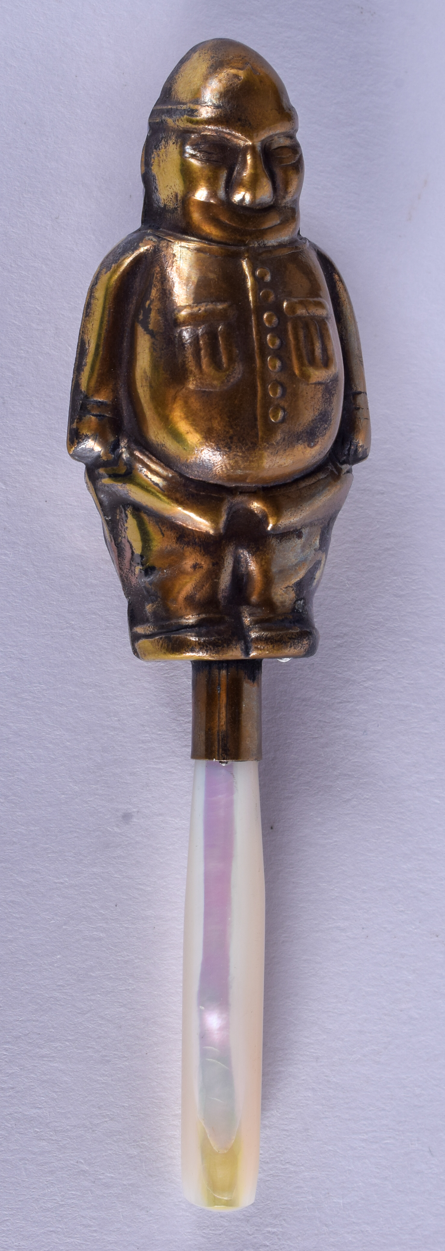 A BRASS POLICEMAN RATTLE. 11 cm long.