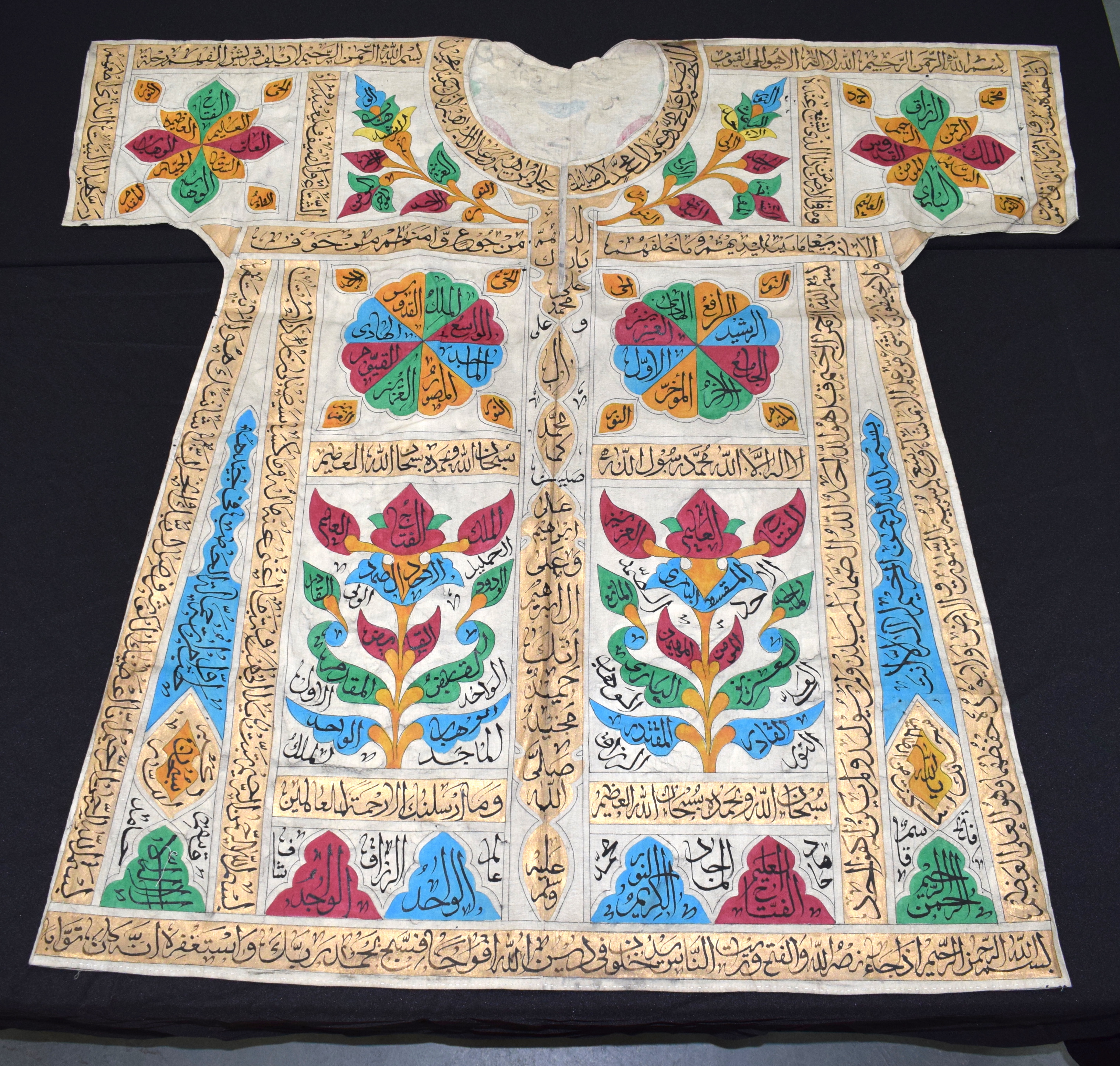 AN UNUSUAL VINTAGE OTTOMAN MIDDLE EASTERN CALLIGRAPHY SHIRT painted with scripture.