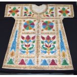 AN UNUSUAL VINTAGE OTTOMAN MIDDLE EASTERN CALLIGRAPHY SHIRT painted with scripture.