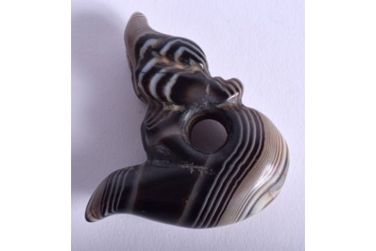 A CENTRAL ASIAN AGATE PENDANT. 5.5 cm x 5 cm. - Image 1 of 2