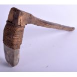 AN UNUSUAL 19TH CENTURY CARVED STONE TRIBAL ROPE BOUND AXE. 56 cm x 25 cm.