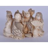A 19TH CENTURY JAPANESE MEIJI PERIOD CARVED IVORY NETSUKE modelled with numerous figures. 5 cm x 3.