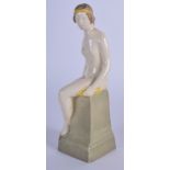 A RARE ROYAL WORCESTER PORCELAIN FIGURINE OF A NUDE BATHER, puce mark to base, circa 1918. 14 cm hi