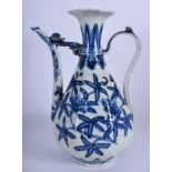 A 20TH CENTURY CHINESE BLUE AND WHITE PORCELAIN EWER, decorated with stylised foliage. 28 cm.