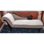 AN ANTIQUE CHAISE LOUNGE, honeycomb type upholstery. 80 cm x 190 cm.