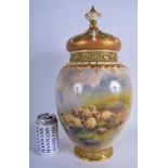 A RARE LARGE ANTIQUE ROYAL WORCETER RETICULATED VASE AND COVER by Harry David, with inner cover, pa