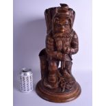 A RARE LARGE 19TH CENTURY BAVARIAN BLACK FOREST CARVED GNOME WOOD CARRIER with removable cover reve