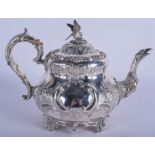 A GOOD ANTIQUE SILVER TEAPOT decorated with foliage. London 1875. 26 oz. 27 cm x 20 cm.