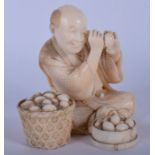 A LOVELY 19TH CENTURY JAPANESE MEIJI PERIOD CARVED IVORY OKIMONO modelled as a male inspecting eggs