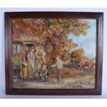 A FRAMED WOOLWORK PICTURE, depicting figures outside a cottage. 44 cm x 52 cm.