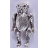 A SILVER BEAR PIN CUSHION. 4 cm wide.