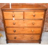 A VICTORIAN CHEST OF DRAWERS, formed with two short and three long graduated drawers. 119 cm x 119
