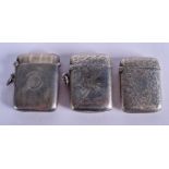 THREE ANTIQUE SILVER VESTA CASES. (3)