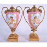 A FINE PAIR OF 19TH CENTURY FRENCH ORMOLU SEVRES PORCELAIN VASES with inter changeable candlestick