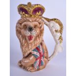 A GOLDSCHEIDER ENGLISH PATRIOTIC FIGURE OF A LION, formed with a unicorn handle. 16.5 cm high