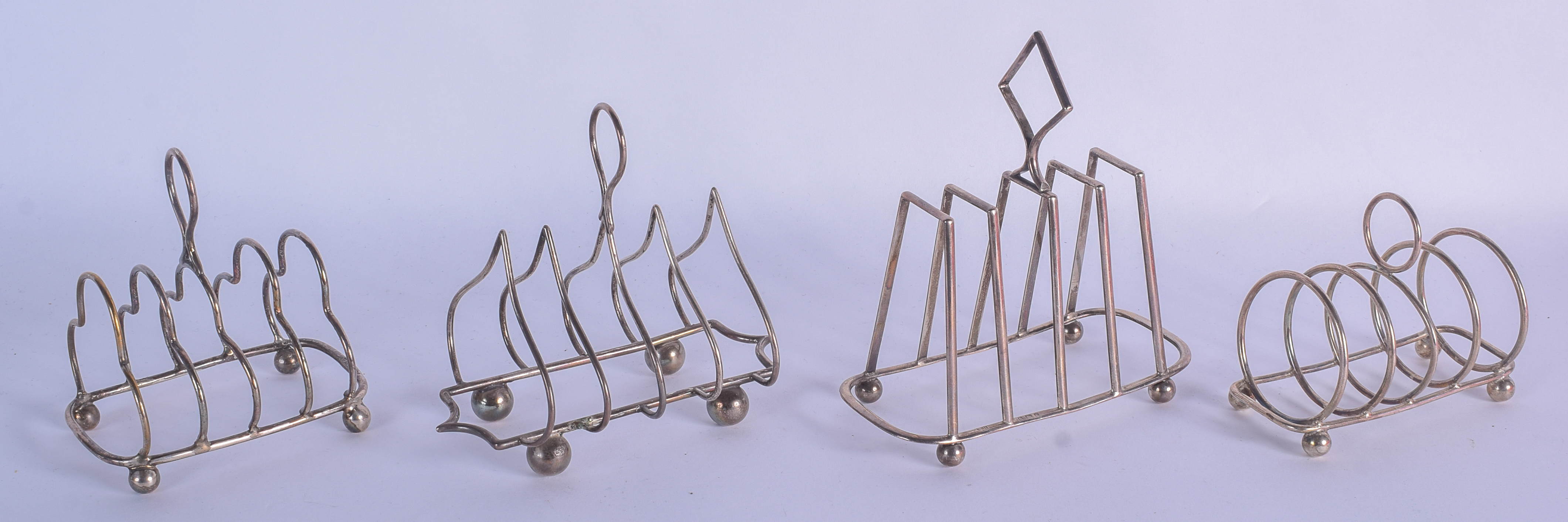 FOUR ENGLISH VINTAGE SILVER TOAST RACKS. 10.5 oz. (4)