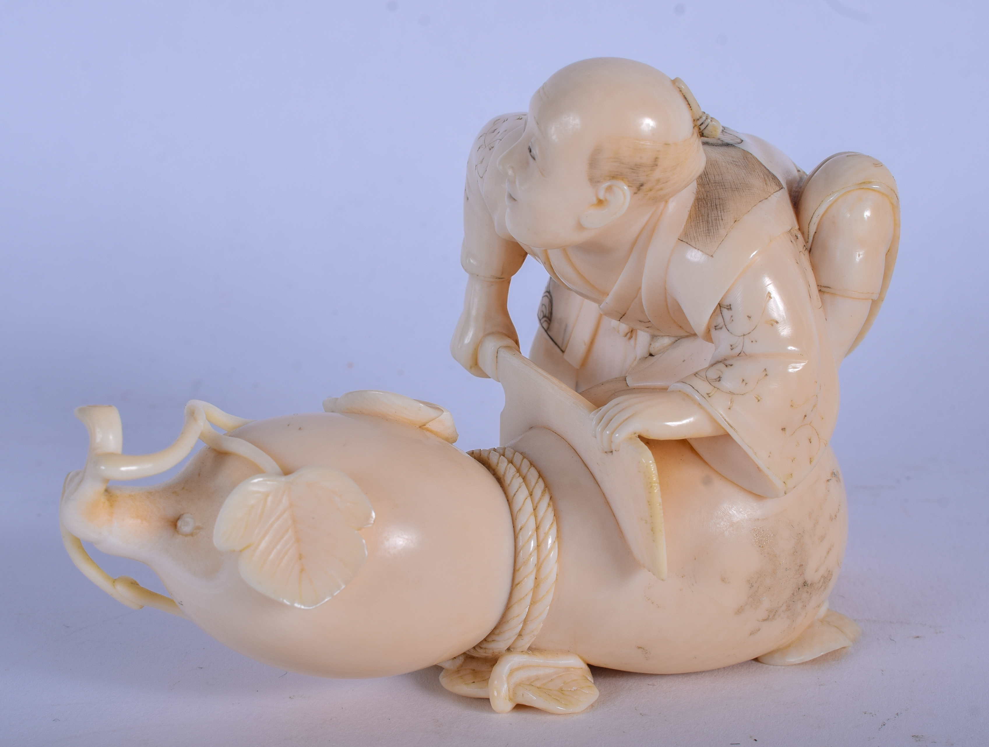 A 19TH CENTURY JAPANESE MEIJI PERIOD CARVED IVORY OKIMONO modelled as a vegetable chopper. 11 cm x - Bild 2 aus 4