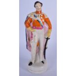 A STAFFORDSHIRE POTTERY FIGURINE IN THE FORM OF THE DUKE OF WELLINGTON, modelled with his sword at