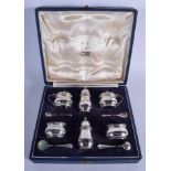 A CASED SET OF GOLDSMITHS & SILVERSMITHS COMPANY SILVER CRUET SET. Silver 7.5 oz. (9)