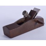 A JAPANESE BRONZE OKIMONO modelled as a carpenters plane. 8.5 cm wide.