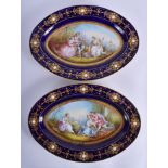 A LARGE PAIR OF 18TH/19TH CENTURY SEVRES PORCELAIN DISHES jewelled and decorated with gilt flowers.