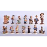 A COLLECTION OF THIRTEEN HUMMEL FIGURES of various sizes. (qty)