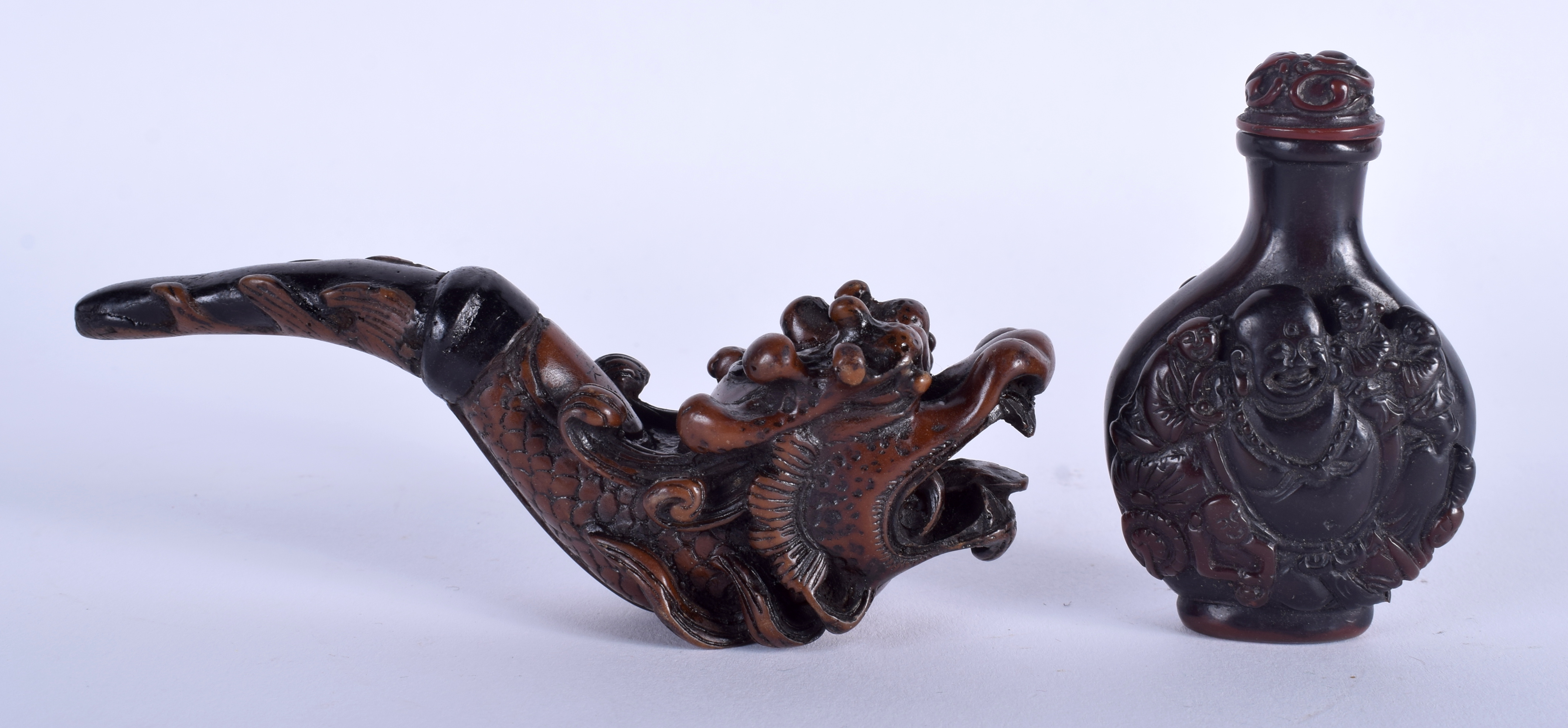 A CHINESE PIPE and a snuff bottle. (2)