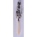 A SILVER BABIES RABBIT RATTLE. 11.5 cm long.