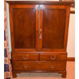 A GEORGE III CUPBOARD ON STAND, formed with two short and one long drawyer. 170 cm x 122 cm.