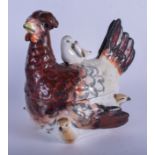 AN EARLY 19TH CENTURY PEARLWARE HEN TUREEN, formed with a chick upon its back. 18 cm wide.