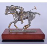 A ROYAL SELAMOOR PEWTER FIGURINE OF A POLO PLAYER, signed R. cameron. 18 cm x 20.5 cm.