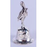 A SILVER STORK BELL. 3.25 cm high.