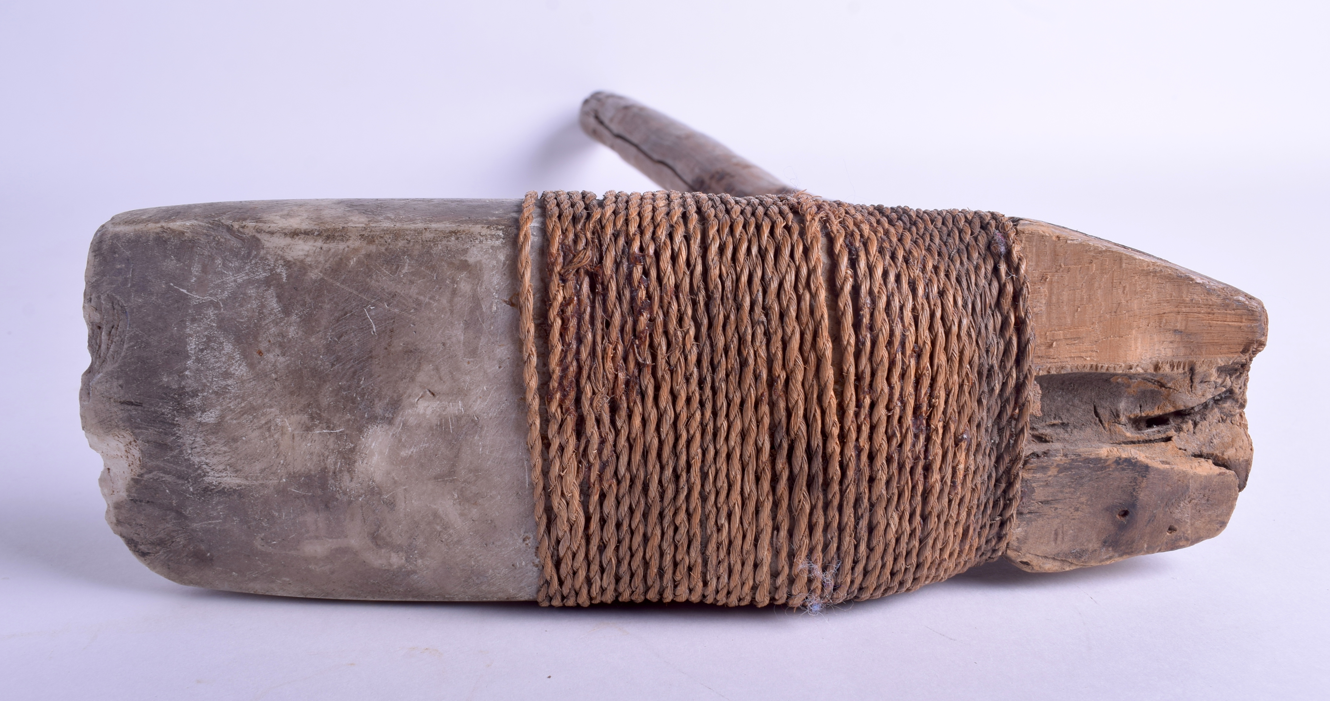 AN UNUSUAL 19TH CENTURY CARVED STONE TRIBAL ROPE BOUND AXE. 56 cm x 25 cm. - Image 3 of 4