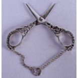 A PAIR OF SILVER SCISSORS. 5 cm wide.