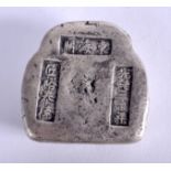 A CHINESE WHITE METAL INGOT. 193 grams. 4.5 cm wide.