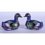 A PAIR OF CHINESE CLOISONNE ENAMEL DUCKS. 9 cm wide.