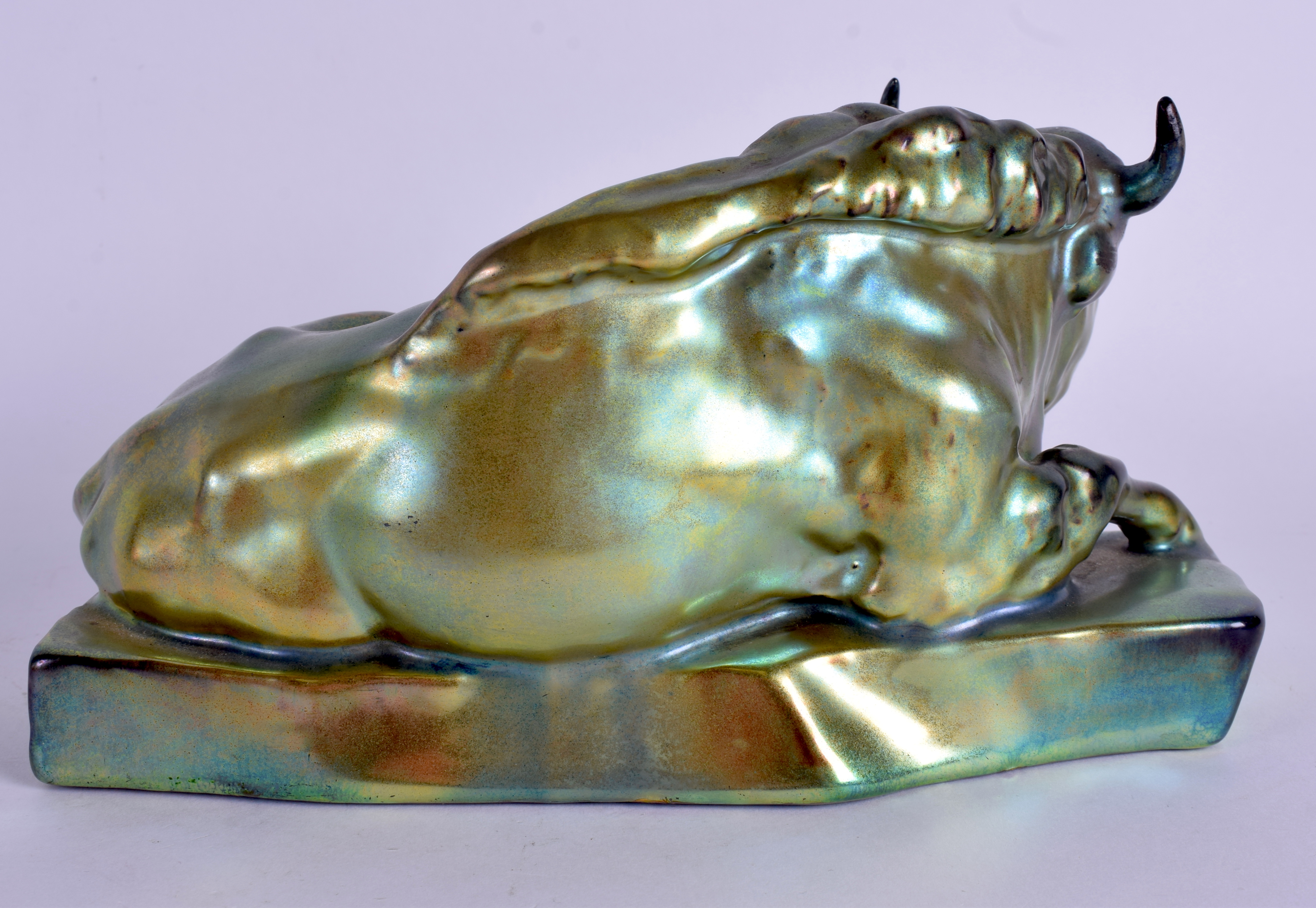 AN UNUSUAL HUNGARIAN ZSOLNAY PECS LUSTRE FIGURE OF A BULL modelled recumbent. 22 cm x 11 cm. - Image 2 of 3