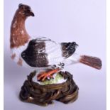 A GOOD 19TH CENTURY MEISSEN PORCELAIN FIGURE OF A NESTING BIRD upon a fine quality scrolling ormolu