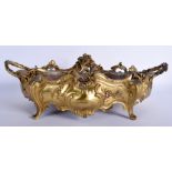 A 19TH CENTURY FRENCH TWIN HANDLED BRONZE PLANTER of naturalistic scrolling form, decorated with fo