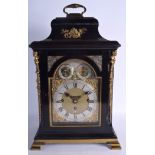 A GEORGE III EBONISED BRACKET CLOCK by Thomas Washbourn of London, decorated with foliage and scrol