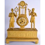 A RARE AND UNUSUAL EARLY 19TH CENTURY FRENCH ORMOLU EMPIRE PERIOD MANTEL CLOCK formed as a tribute