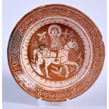 A PERSIAN POTTERY BOWL, decorated a figure on horseback. 24.5 cm wide